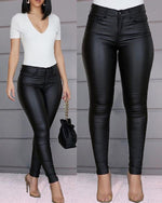 Pantaloni a vita alta in similpelle a taglio slim da donna  