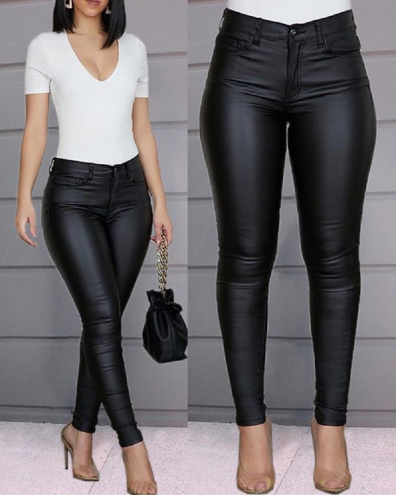Pantaloni a vita alta in similpelle a taglio slim da donna  