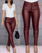 Pantaloni a vita alta in similpelle a taglio slim da donna  