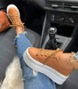 Sneaker con zeppa e suola spessa in similpelle per donna