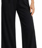 Pantaloni larghi fluidi in crepe per donna