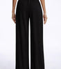 Pantaloni larghi fluidi in crepe per donna