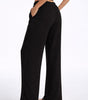 Pantaloni larghi fluidi in crepe per donna