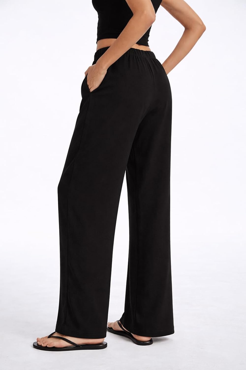 Pantaloni larghi fluidi in crepe per donna
