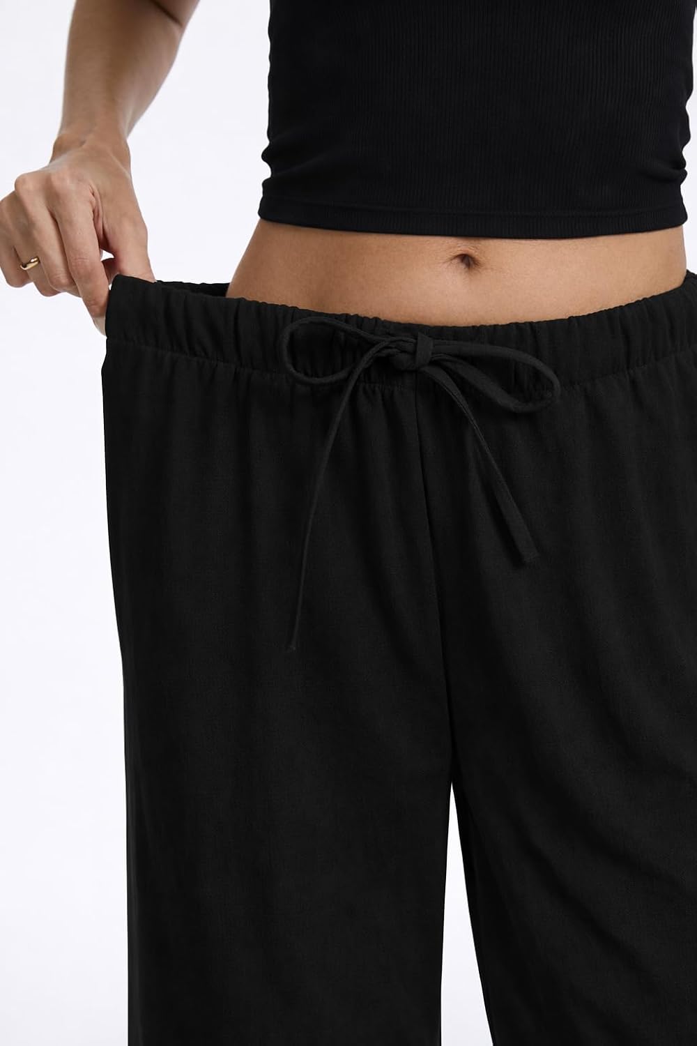 Pantaloni larghi fluidi in crepe per donna