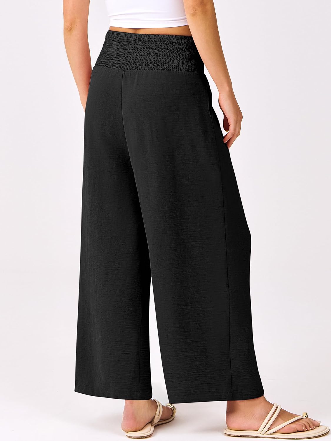 Pantaloni palazzo fluidi a vita alta con tasche per donna