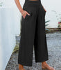 Pantaloni palazzo fluidi a vita alta con tasche per donna