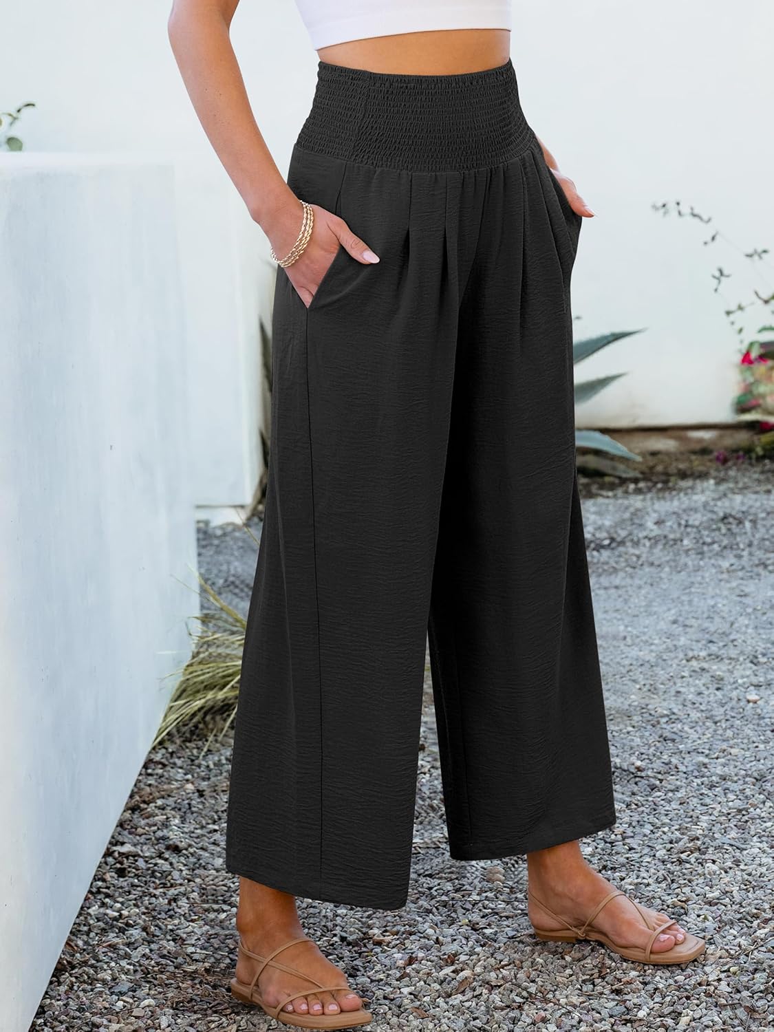 Pantaloni palazzo fluidi a vita alta con tasche per donna