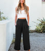 Pantaloni palazzo fluidi a vita alta con tasche per donna