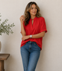 Blusa con scollo a V e dettaglio raffinato per donna