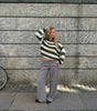 Maglione a maniche lunghe e collo tondo in maglia grossa a righe per donna