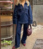 Pantaloni larghi e lunghi in denim con cuciture a vista da donna