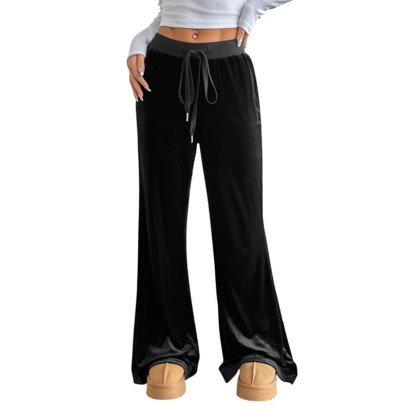 Pantaloni larghi in velluto con vita elastica da donna