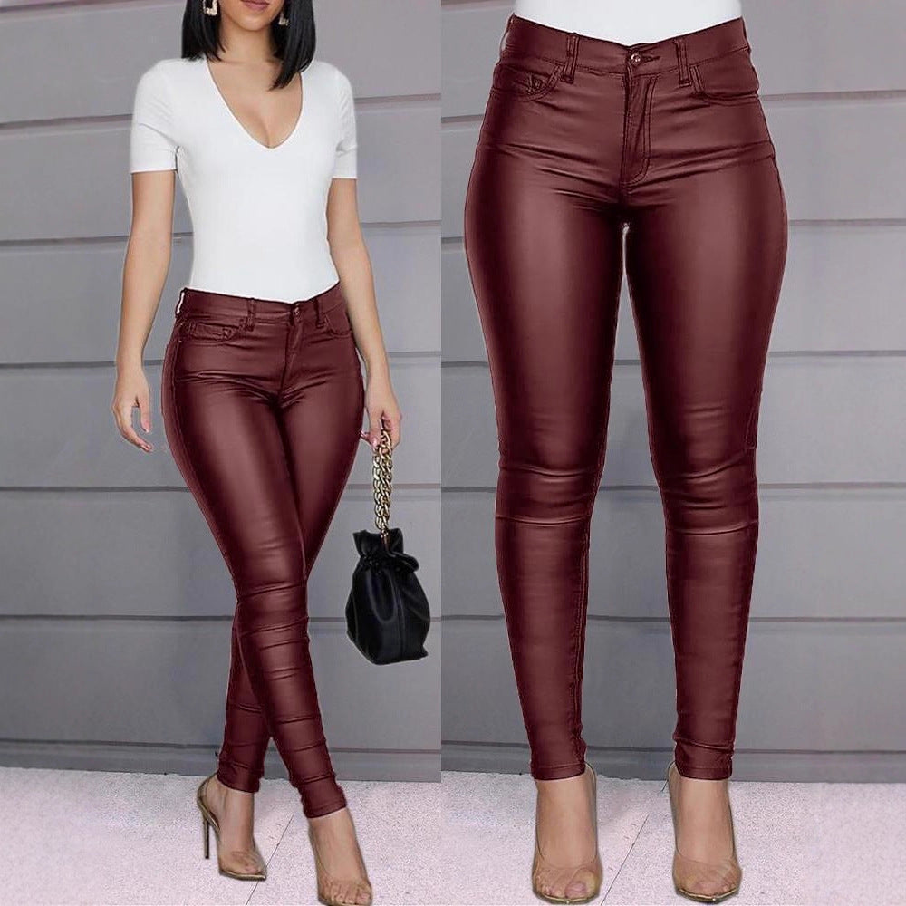 Pantaloni a vita alta in similpelle a taglio slim da donna  