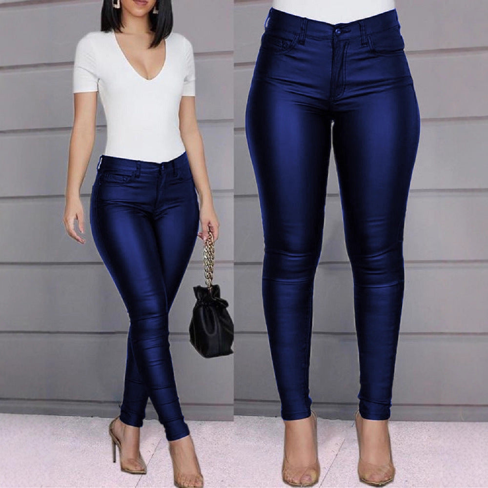 Pantaloni a vita alta in similpelle a taglio slim da donna  