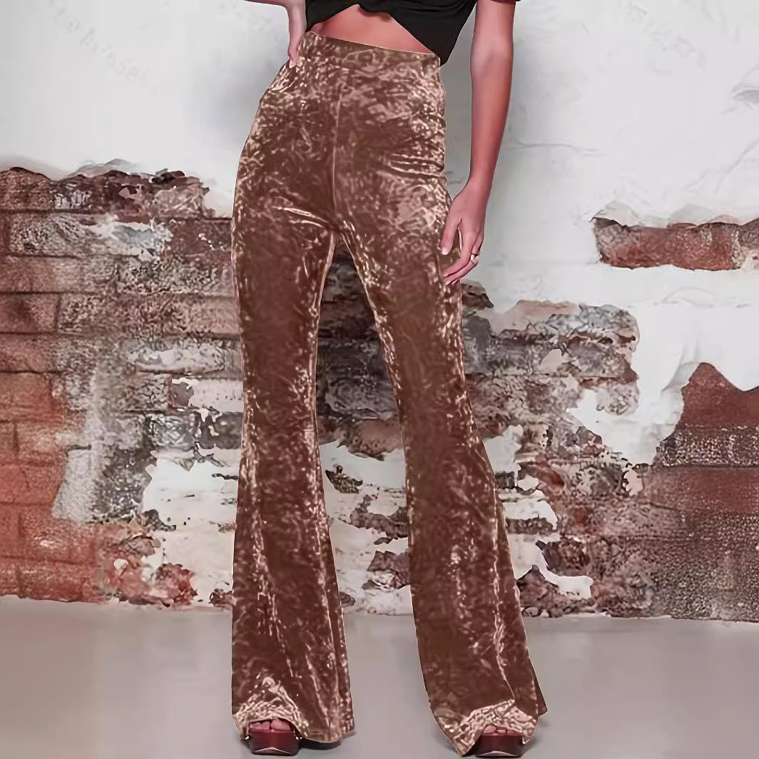 Pantaloni larghi a vita alta e lucidi da donna