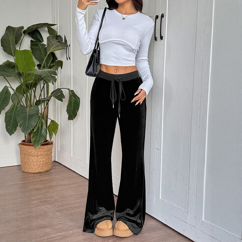 Pantaloni larghi in velluto con vita elastica da donna