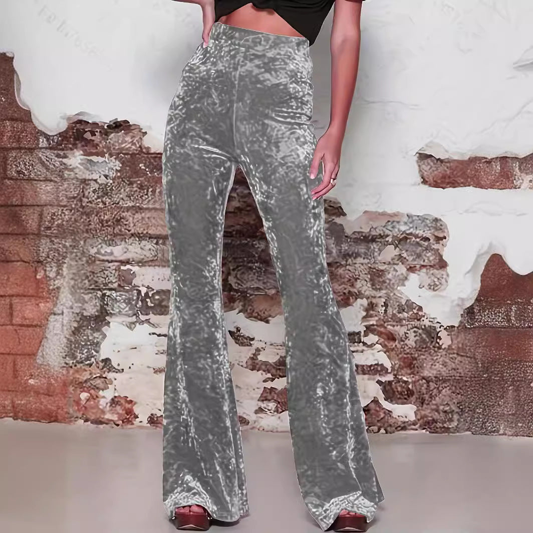 Pantaloni larghi a vita alta e lucidi da donna