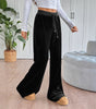 Pantaloni larghi in velluto con vita elastica da donna