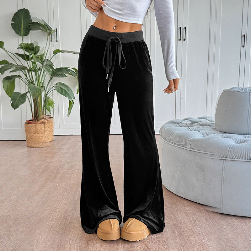 Pantaloni larghi in velluto con vita elastica da donna