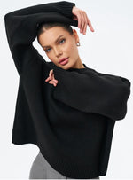 Maglione oversize con collo alto a coste per donna