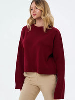 Maglione oversize con collo alto a coste per donna