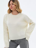 Maglione oversize con collo alto a coste per donna