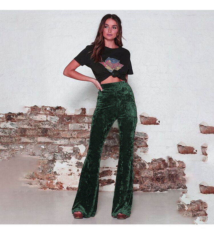 Pantaloni larghi a vita alta e lucidi da donna