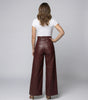 Pantaloni larghi a vita alta in ecopelle con cintura da donna