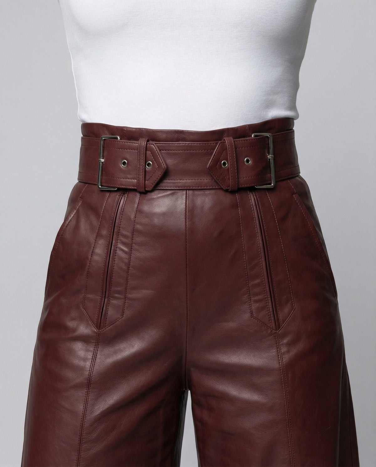 Pantaloni larghi a vita alta in ecopelle con cintura da donna