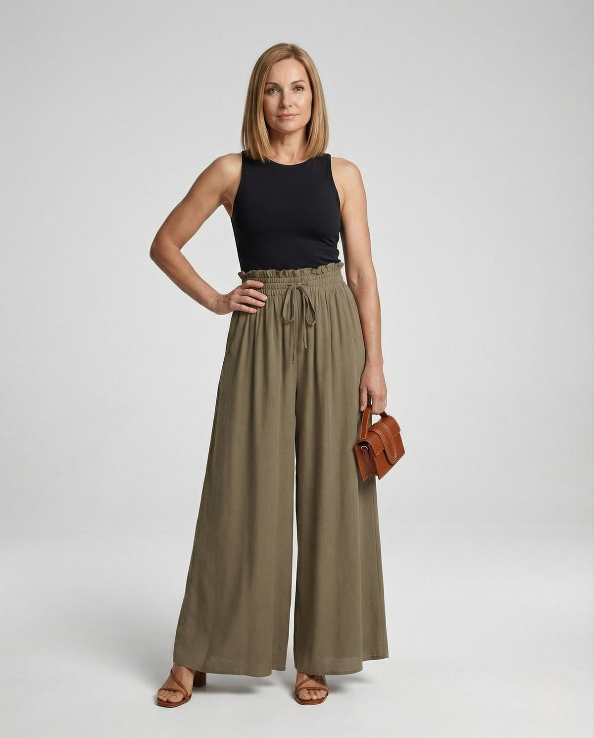 Pantaloni palazzo fluidi e larghi a vita alta da donna  