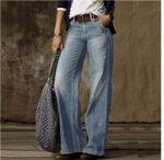 Pantaloni in jeans larghi e slavati a vita media da donna  