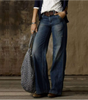 Pantaloni in jeans larghi e slavati a vita media da donna  