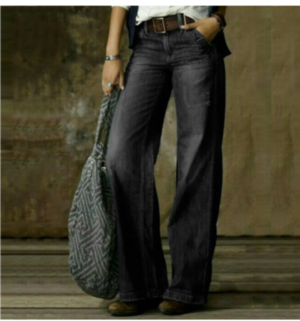 Pantaloni in jeans larghi e slavati a vita media da donna  