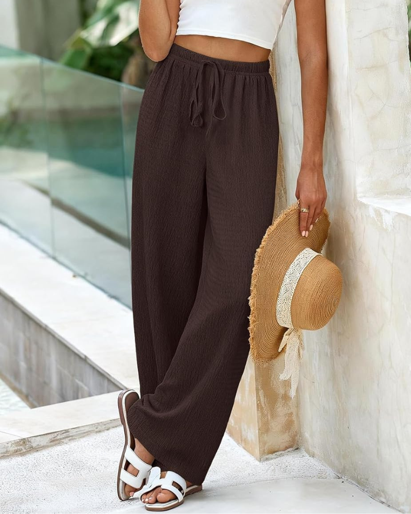 Pantaloni palazzo larghi a vita alta con tasche per donna