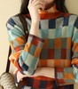 Maglione oversize a quadri con collo alto per donna
