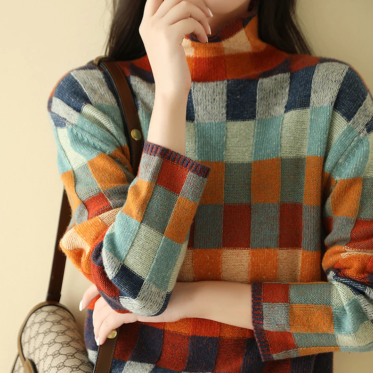 Maglione oversize a quadri con collo alto per donna