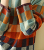 Maglione oversize a quadri con collo alto per donna