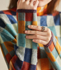 Maglione oversize a quadri con collo alto per donna