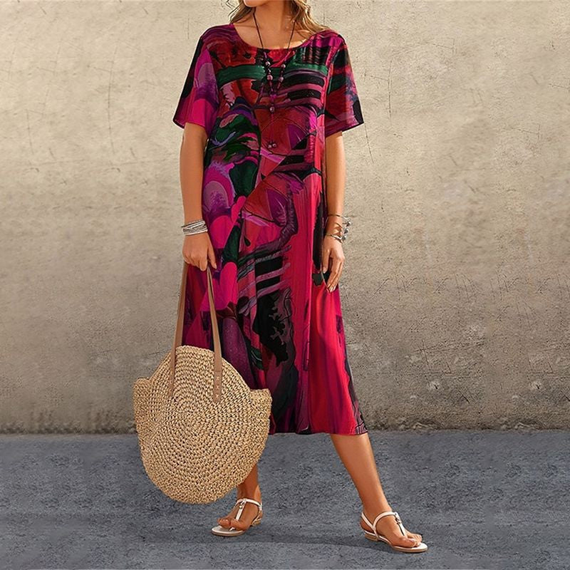 Abito lungo con stampa tropicale e maniche corte da donna